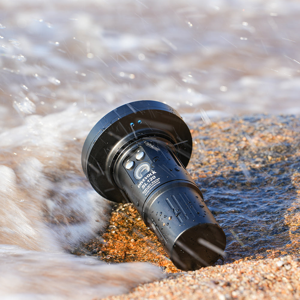 DiveVolk SL120 underwater video light with blue light filter.