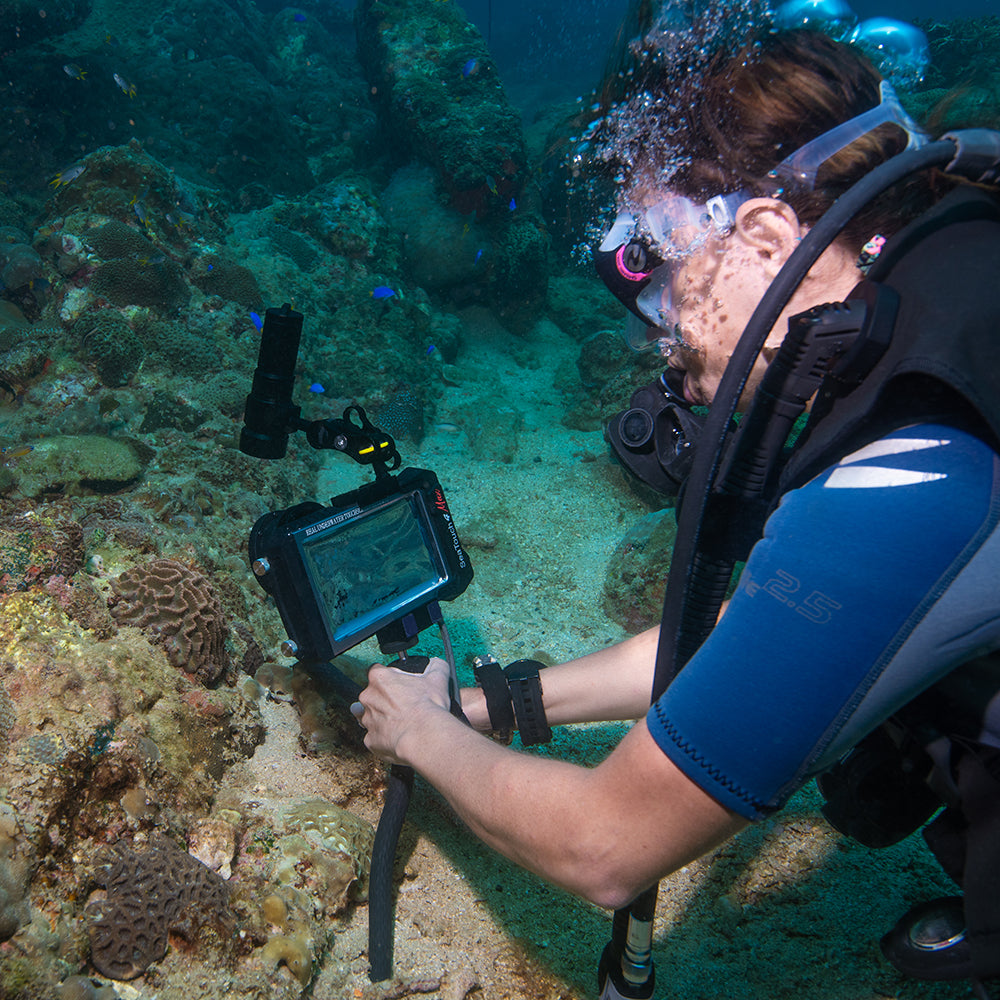SeaTouch 4 Max underwater housing being setup by diver.