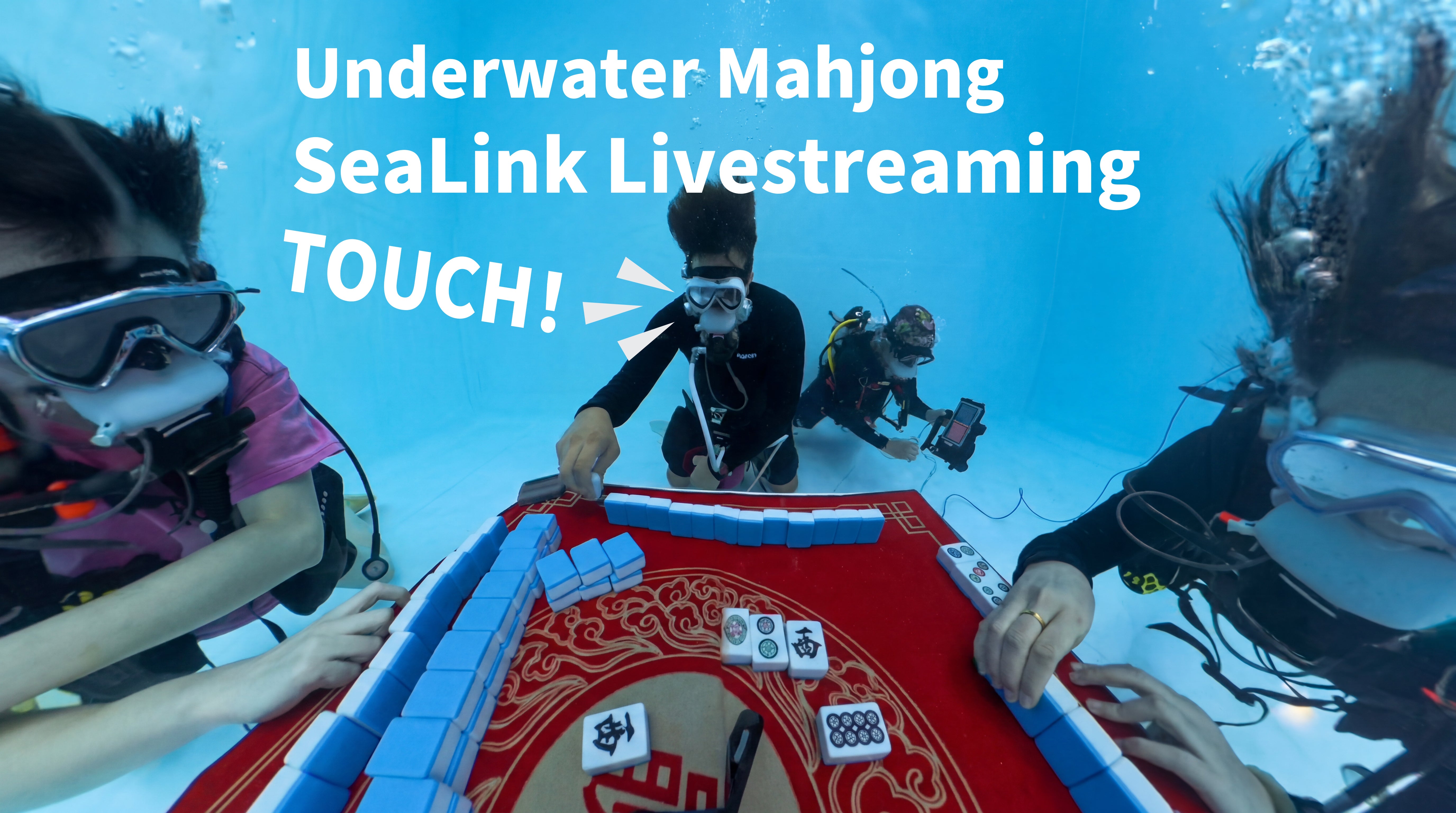 divers playing mahjong underwater
