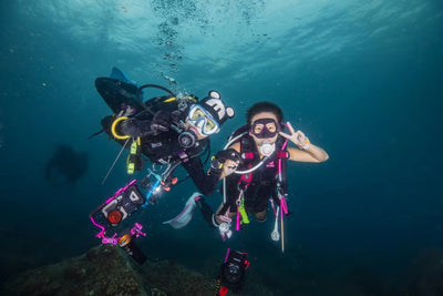 Students make a peace sign at the camera
