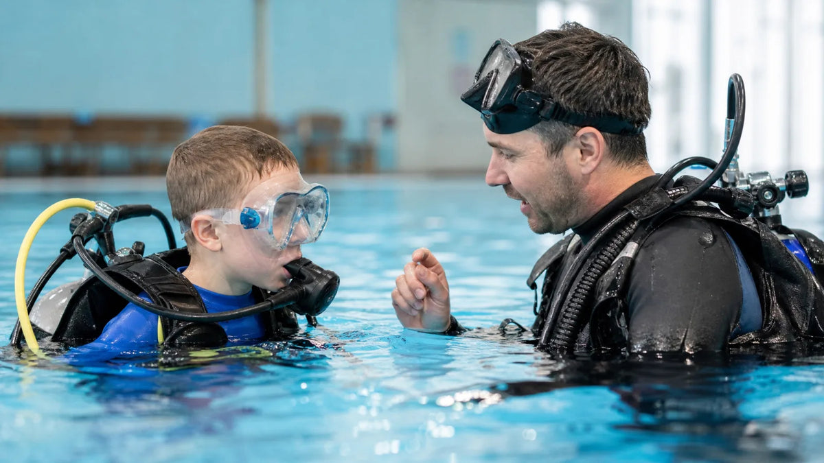 child pool scuba lesson instructor
