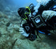 diver holding divevolk seatouch housing underwater