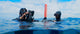 divers set up livestream at surface with sealink float