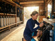 Scuba diving instructor performing a pre-dive gear check