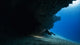 maldives coral reef cave entrance technical diver silhouette