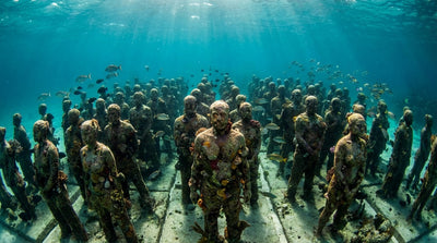 MUSA Cancun underwater sculpture installation The Silent Evolution with coral growth