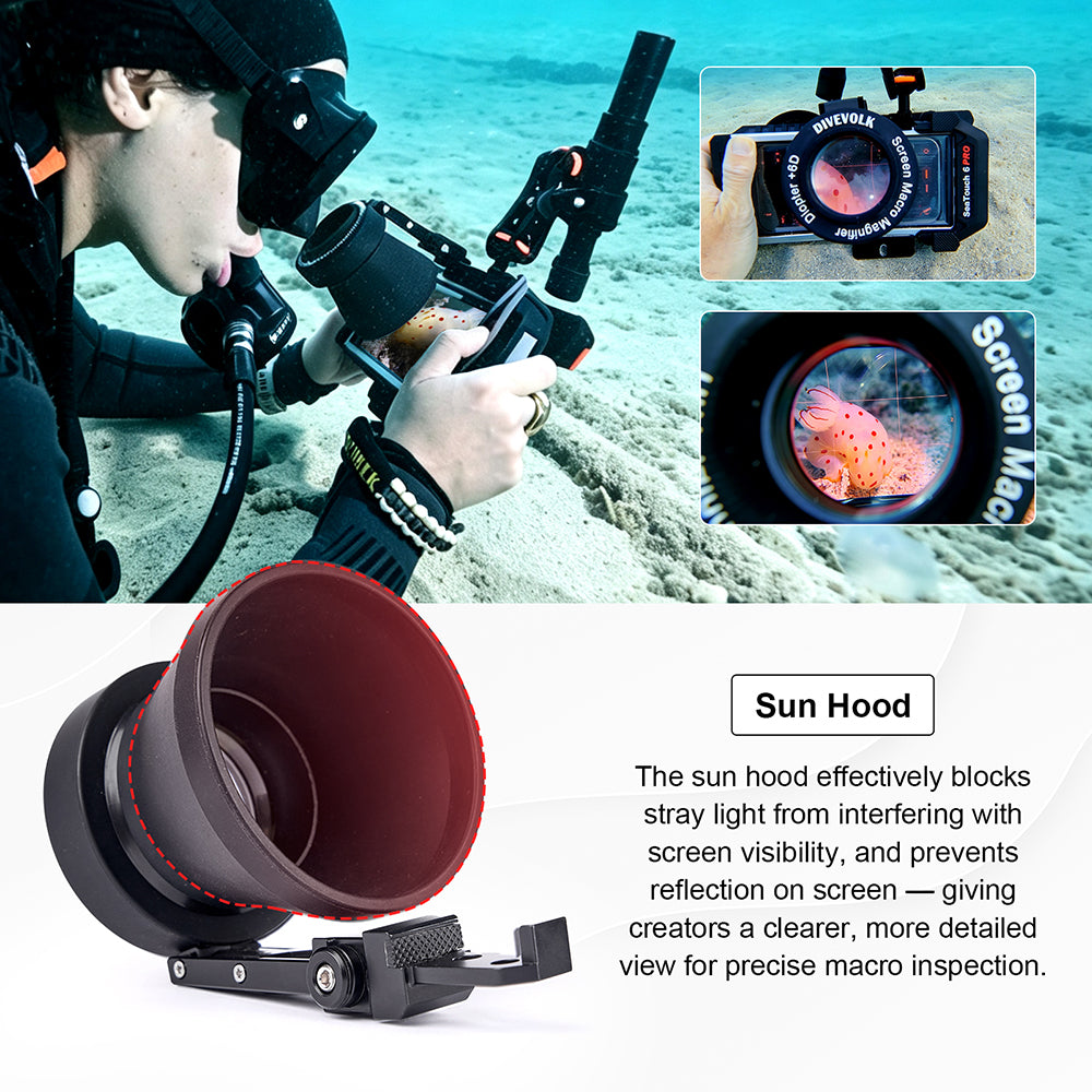 DIVEVOLK Screen Macro Magnifier in use underwater with sun hood — diver inspecting macro subject through magnifier, sun hood blocks stray light and prevents screen reflection for clear macro viewing.
