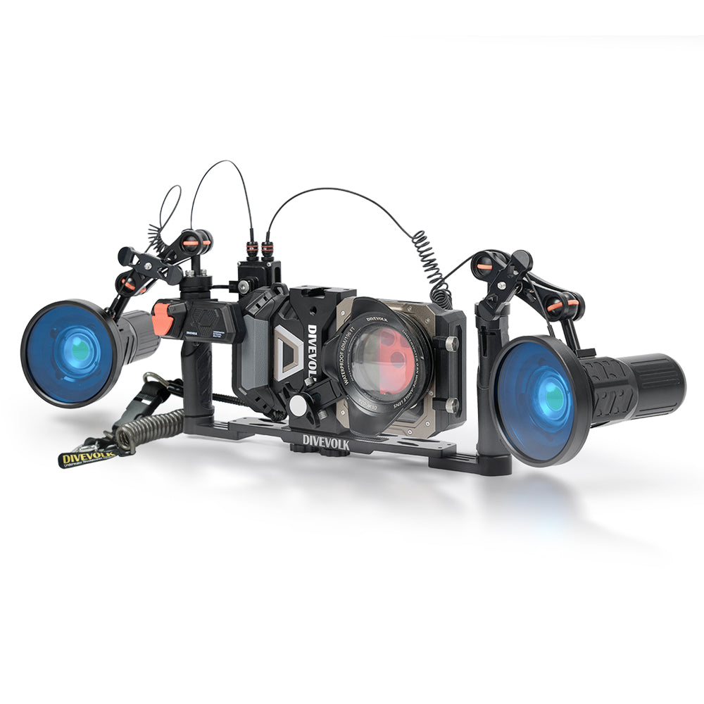 DIVEVOLK SeaTouch 6 PRO Deep Dive SL120 Kit with travel case — housing with wide-angle lens, dual SL120 video lights with ambient blue light filters on extended ball joint arms, optic fibre remote control, DIVEVOLK grey travel case in background.