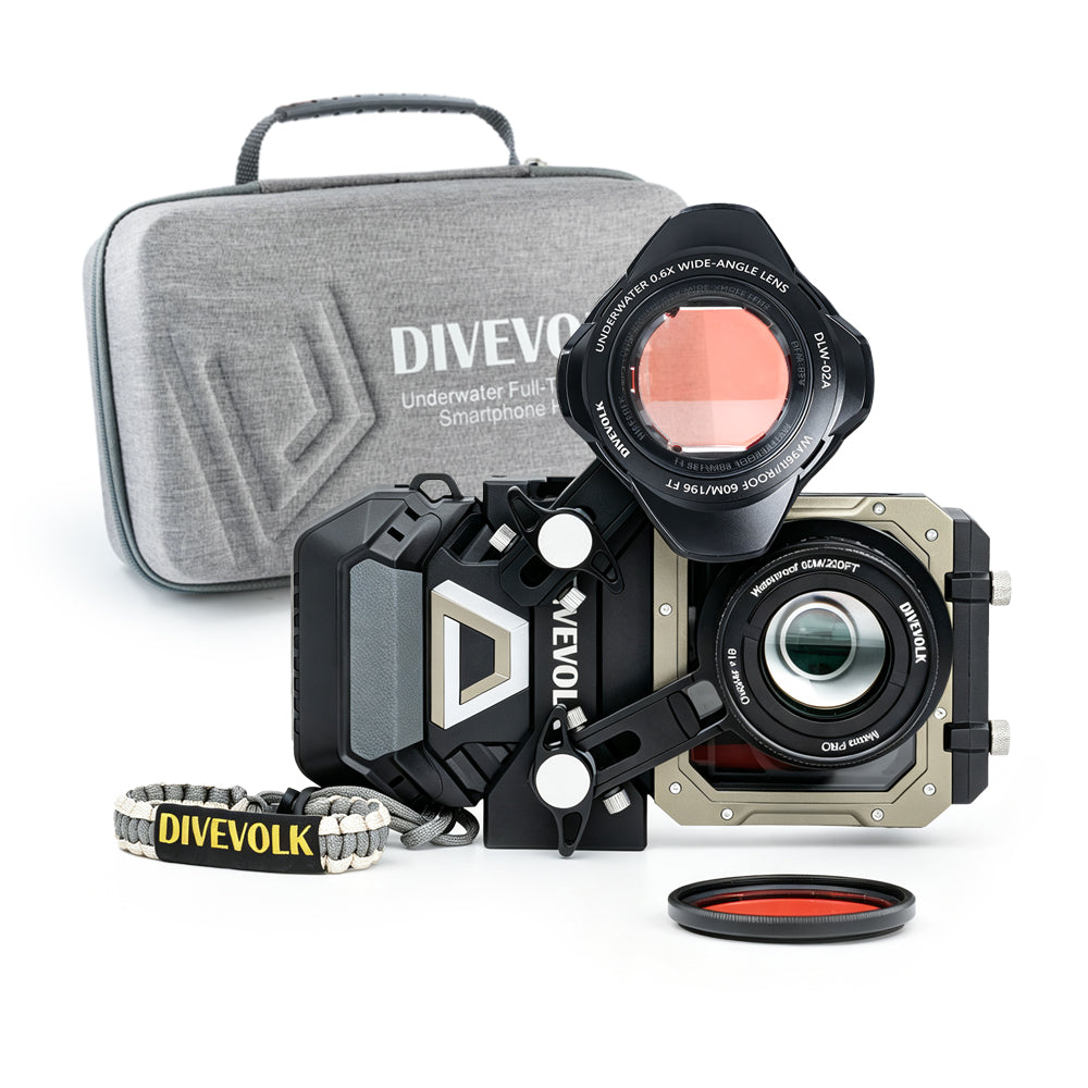 DIVEVOLK SeaTouch 6 PRO Dual Lens Kit with branded travel case — housing with both Macro Pro +18 and Wide-angle Lens DLW-02A, Deep Dive Red Filter, DIVEVOLK grey travel case in background.